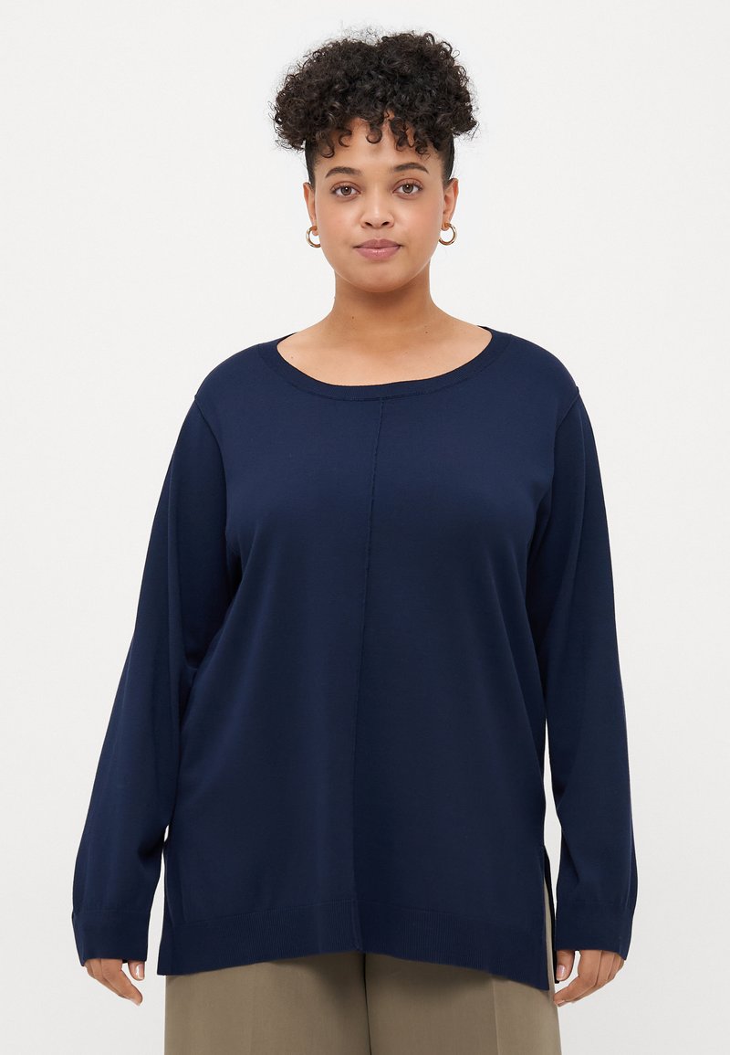 Ναυτικό μπλε μακρυμάνικη μπλούζα από μαλακό ύφασμα, με φαρδιά λαιμόκοψη, χαμηλούς ώμους και χαλαρή εφαρμογή με ριμπ εσωτερικό και μανσέτες.