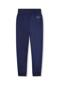 Pantalones de chándal en azul marino con una textura suave, cintura elástica y puños en los extremos. Presenta un pequeño logo de DKNY en el frontal.