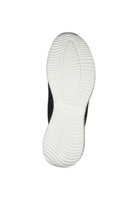 Zapato negro con parte superior de tela texturizada, que cuenta con una suela de goma blanca flexible con patrones acanalados y el nombre de la marca "BOBS" grabado.