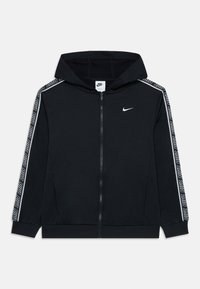 Black Nike zip-up hoodie with white logo on chest and branded tape along sleeves, featuring a hood and front pockets.