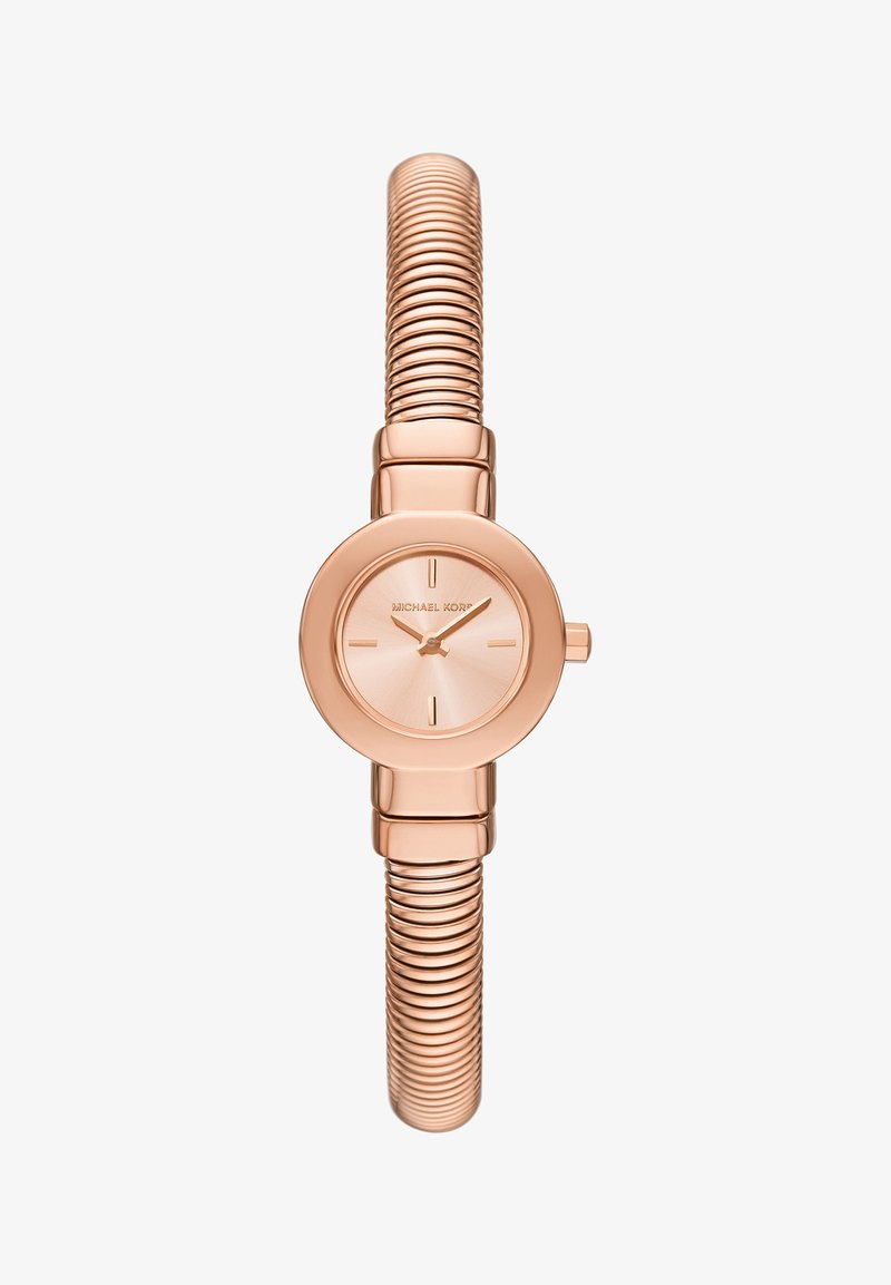 Roségold analog klocka med rund boett, minimalistisk urtavla och ett flexibelt, räfflat metallband för justerbar passform.