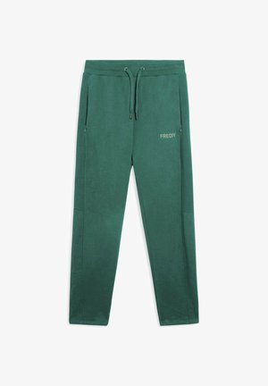 Joggers de color verde oscuro hechos de una tela suave, con cintura elástica y cordones, bolsillos laterales y un pequeño logo "FREDDY".