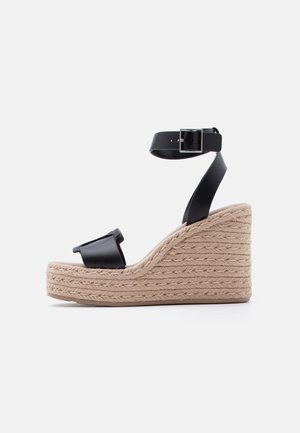Calvin Klein Sandali s platformo - black
