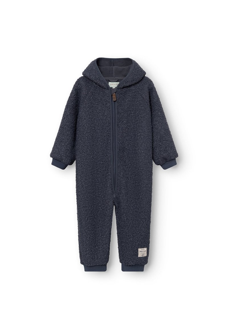 Mörkblå fleeceoverall med huva, med en dragkedja fram och ribbade ärmar. Mjuk, strukturerad tyg med en liten etikett i fållen.