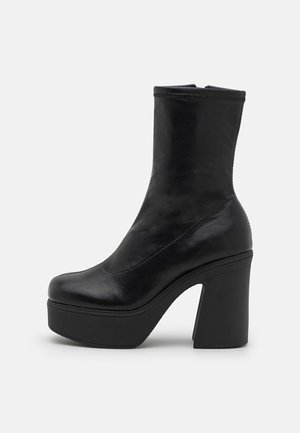 Botines con plataforma - black