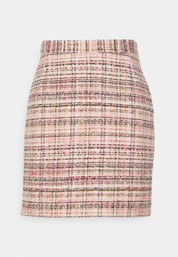 Mini-jupe taille haute à motif tartan multicolore dans des tons de rose, jaune, noir et blanc, avec une silhouette droite.