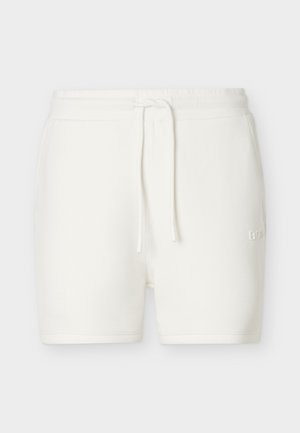 Pantaloncini bianchi in cotone con vita elasticizzata, coulisse frontale, tasche laterali e logo discreto sulla coscia destra.