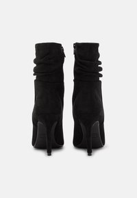 Anna Field Bottines à talons hauts - black