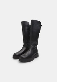 Black leather knee-high boots with a smooth finish, rounded toe, and chunky rubber sole. Features a side zipper for easy wear.