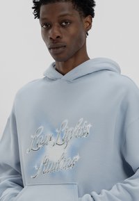 LOW LIGHTS STUDIOS® CHROMATIC HOODIE - Felpa - sky blue