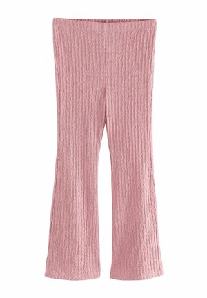 Roze geribde stoffen broek met een lichte flare aan de onderkant, plat gelegd zonder zichtbare sluitingen of zakken.