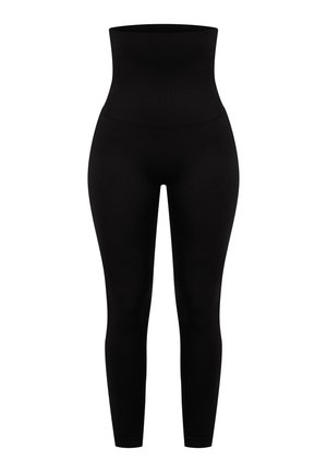 Zwarte high-waisted leggings met een naadloos ontwerp en rekbare stof. Gladde textuur, taps toelopende pijpen en geen zichtbare stiknaden of patronen.