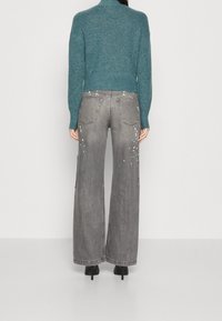 Noisy May Neule - dark green