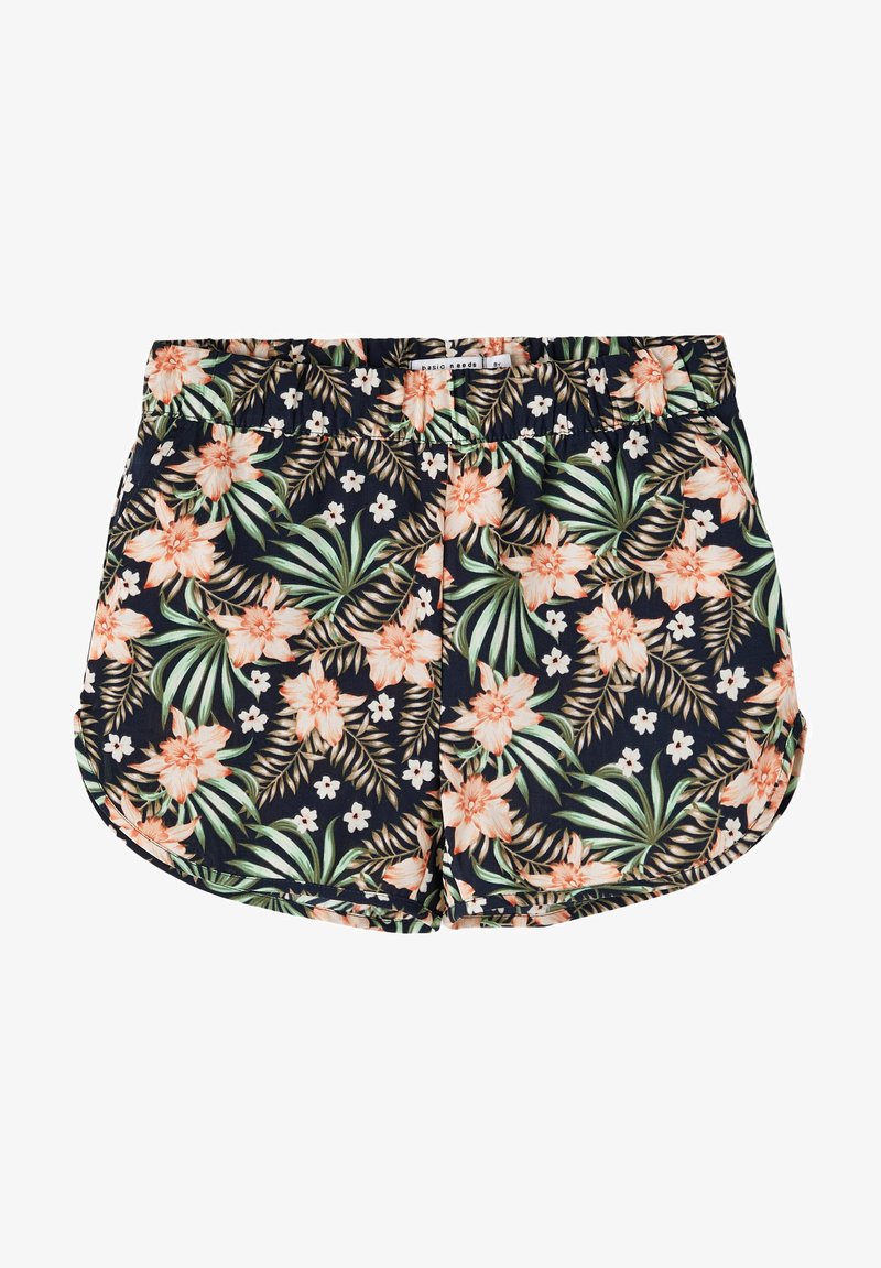 Λουλουδάτες σορτς σε ναυτικό μπλε χρώμα, με τροπικό μοτίβο που περιλαμβάνει λευκά λουλούδια και πράσινα φύλλα. Ελαστική μέση, ελαφρύ ύφασμα και καμπυλωτό στρίφωμα.