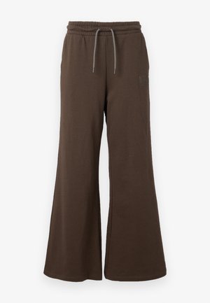 Ruske leve hlače s širokimi nogavicami in elastičnim pasom ter vrvico, narejene iz mehkega blaga. Imajo subtilen logo na strani.