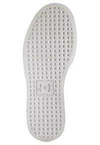 Valkoinen kumipohja, jossa on pyöreäkuvioinen tekstuuri ja keskellä näkyvä DC-logo. Sileät reunat, ei erottuvia merkintöjä.