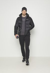 Champion HOODED JACKET - Spordijakk - black