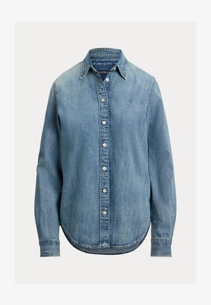 Šviesiai mėlyna džinsinė mygtukinė palaidinė su apykakle, ilgomis rankovėmis ir apvalia apačia. Savybė – balti mygtukai ir subtili tekstūra audinyje.