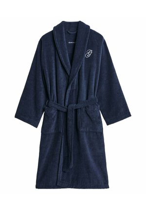 Accappatoio in spugna color blu navy con maniche lunghe, colletto a scialle, cintura e due tasche frontali. Presenta un logo ricamato sul petto.