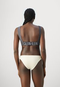 Calvin Klein Swimwear CROP - Accesoriu plajă - black