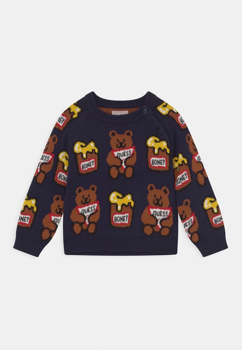 Pull bleu marine avec un motif répétitif d'ours bruns souriants tenant des pancartes "Guess" et des pots de miel étiquetés "Honey" avec du miel qui coule.