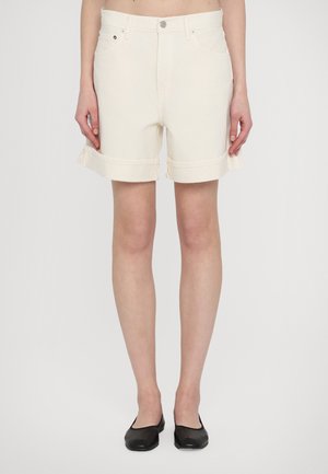 Shorts made of light-colored denim with a rolled hem, featuring front pockets and a single button closure. Smooth texture, casual design.