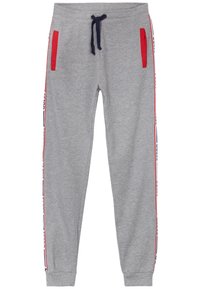 Grijze joggingbroek met marineblauwe trekkoord, rode zijzakken en gestreepte patronen langs de zijkanten. Zacht materiaal met een taps toelopend ontwerp.