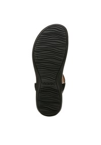 Suola di scarpa in gomma nera con motivo a onda, dotata di un tacco parziale. Marchio "Vionic" visibile sulla suola, a indicare il brand.