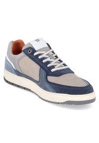 Casual sneaker with beige mesh, navy and blue suede panels, white laces, orange inner lining, and a white rubber sole with gray tread.