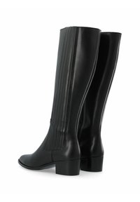 Botas negras hasta la rodilla hechas de cuero suave. Presentan acentos ribeteados verticales, un cierre lateral y un tacón cuadrado para mayor estabilidad.