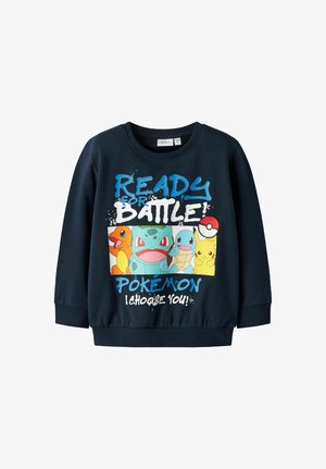 Tamsiai mėlynas džemperis su užrašu „Pasiruošęs kovai! Pokémon - tave renkuosi!“ ir Charmander, Bulbasaur, Squirtle, Pikachu bei Poké kamuoliuko vaizdais.