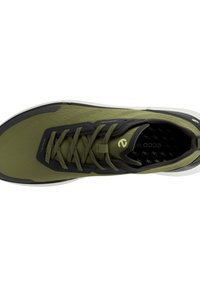 Lace-up athletic shoe in olive green and black, featuring a textured upper, padded collar, and a white rubber sole.