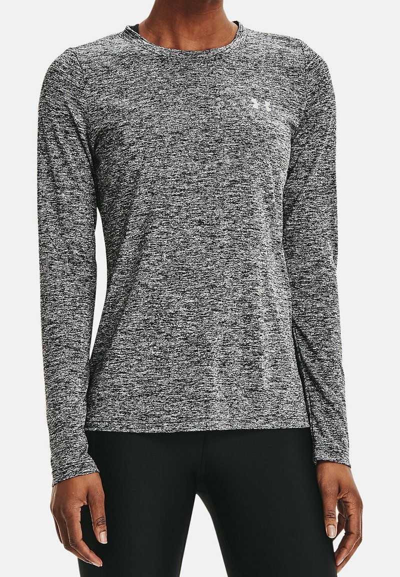 Langärmliges Sportshirt in einem schwarz-weißen Melange-Muster. Weicher, atmungsaktiver Stoff mit Rundhalsausschnitt und Logodetail auf der Brust.