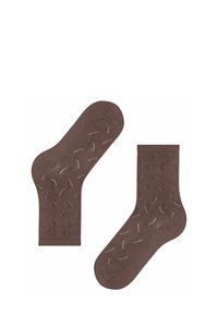 Brązowe bawełniane skarpetki z fakturowanym wzorem szwów. Długość do kostki, miękkie wykończenie oraz elastyczne ściągacze zapewniające pewne dopasowanie.