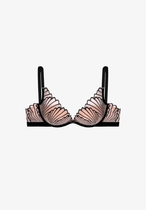 Bra with a peach base, featuring black scalloped lace detailing and adjustable black straps. Heart-shaped hardware at the center front.