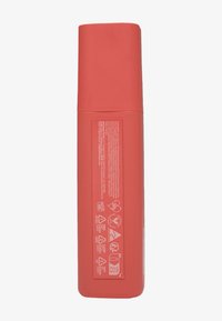 Red plastic container with a smooth surface, rectangular shape, upright design, featuring text and icons on one side.