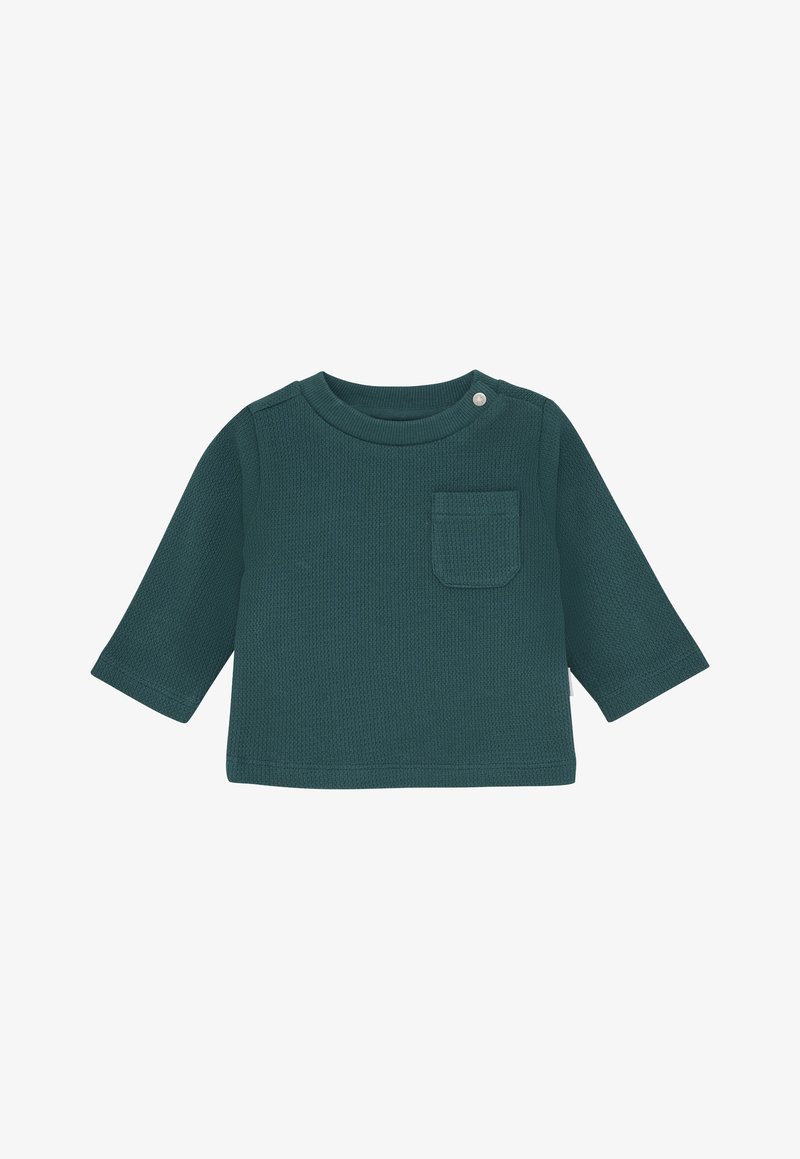 Grünes Langarmoberteil aus strukturiertem Rippenstoff, mit rundem Halsausschnitt, einer Brusttasche und Druckknopfverschluss an der Schulter.