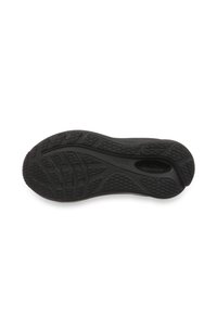 Semelle de chaussure en caoutchouc noir avec un motif de grip texturé, comprenant des sections de bande de roulement hexagonales et courbées pour la traction et la flexibilité.
