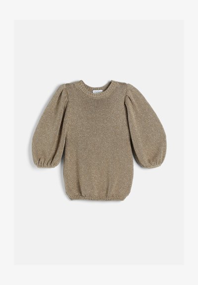 Pull en maille beige avec manches longues bouffantes et poignets, encolure et bas côtelés, posé à plat sur un fond blanc.
