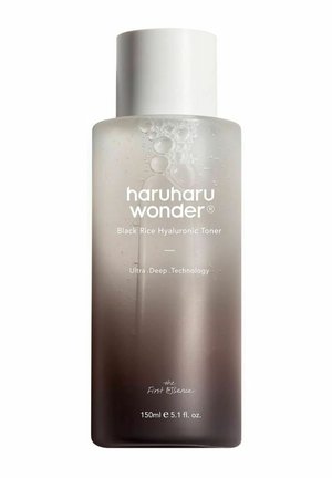 Klar mattierte Flasche des Haruharu Wonder Black Rice Hyaluronic Toners, 150 ml, mit weißem Verschluss und sichtbaren Flüssigkeitsblasen im Inneren.