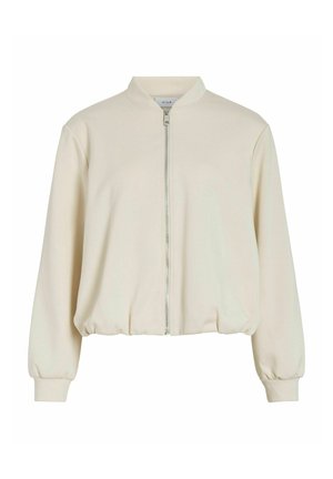 Veste bomber de couleur crème avec fermeture éclair frontale, col côtelé, poignets et ourlet élastiqués, présentée sur fond blanc.