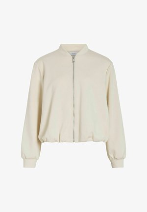 Veste bomber de couleur crème avec fermeture éclair frontale, col côtelé, poignets et ourlet élastiqués, présentée sur fond blanc.
