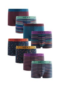 Siete pares de calzoncillos tipo bóxer para hombre en varios patrones coloridos de rayas y puntos, cada uno con una cinturilla de marca que dice "NEXT."