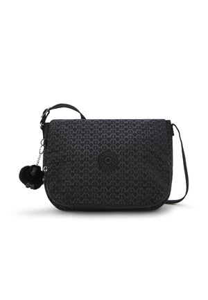 Black crossbody bag with a diamond pattern, featuring a logo patch, zip closure, and a detachable pom-pom charm. Adjustable strap included.