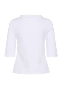 Top blanc à manches courtes avec un col à volants, présenté de dos, avec un design simple et épuré et un ourlet droit.