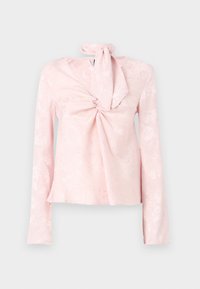 Blusa rosa a maniche lunghe con motivo floreale, dettaglio frontale attorcigliato e cravatta al collo. Realizzata in tessuto morbido con una leggera lucentezza.