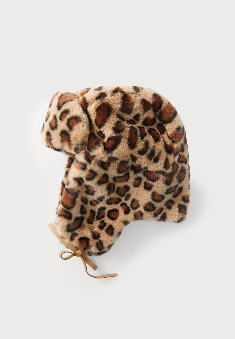 Leopard print faux fur hat with ear flaps, featuring a tan tie closure and soft, textured fabric. Brand label visible on the side.