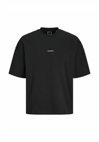 T-shirt nera a maniche corte in cotone, con scollo rotondo e stampa bianca con il testo "CORE CREATIVE" sul davanti.