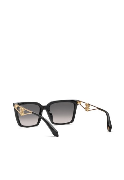 Lunettes de soleil carrées noires avec verres dégradés foncés et détails métalliques dorés sur les branches.