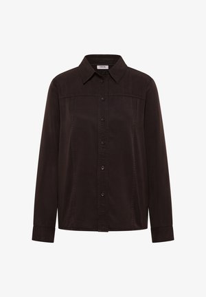 Mørkebrune langærmede skjorte i blødt bomuld, med knaplukning fortil, klassisk krave og detaljer langs sidesømmen. Enkel design.